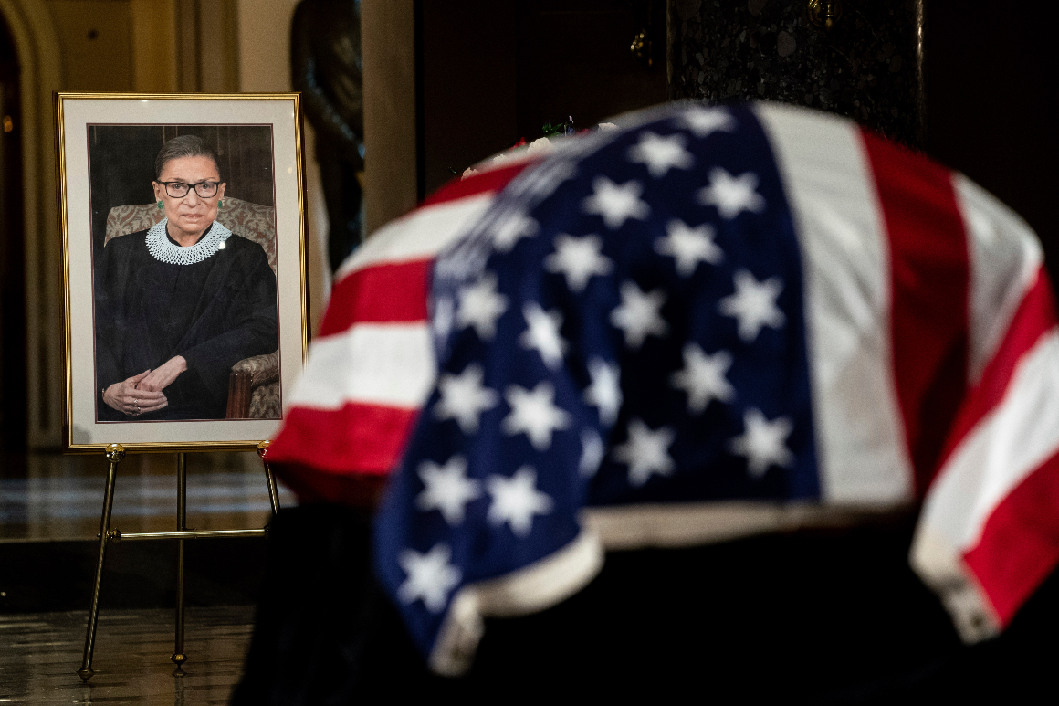 The flag-draped casket of Justice Ruth Bader Ginsburg lies in state in the U.S. Capitol. | AP Photo