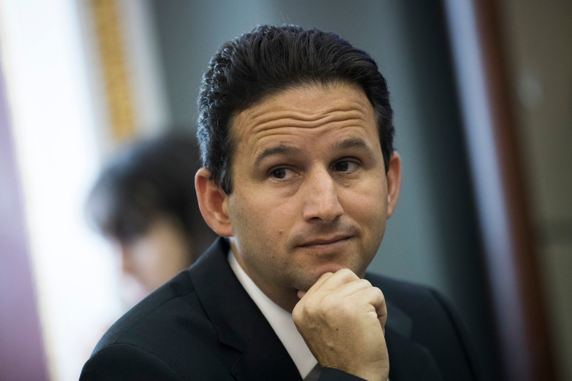 Sen. Brian Schatz (D-Hawaii) speaks with reporters about health care on Capitol Hill