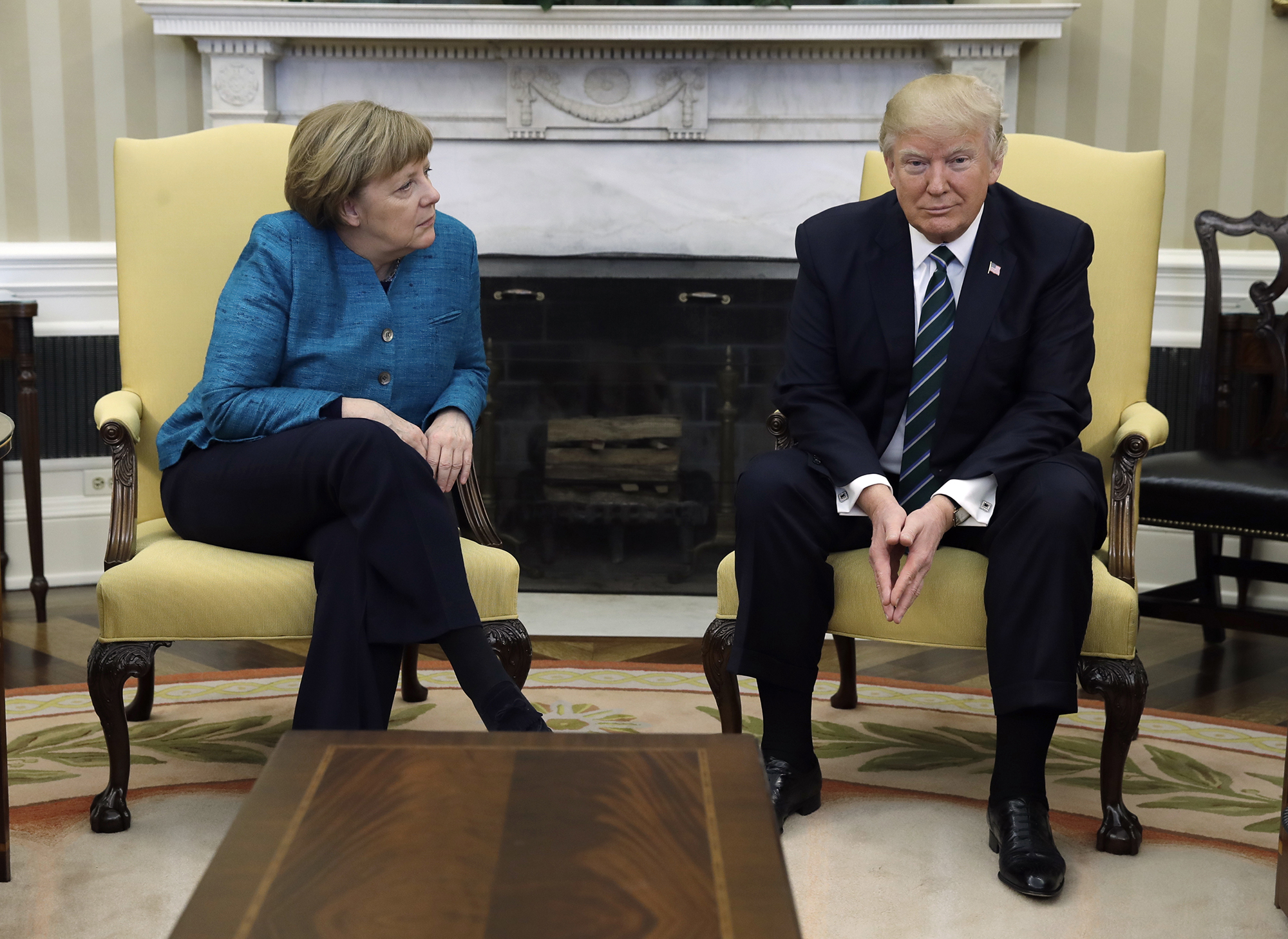 President Donald Trump meets with German Chancellor Angela Merkel in the Oval Office of the White House in Washington, Friday, March 17, 2017. (AP Photo/Evan Vucci)