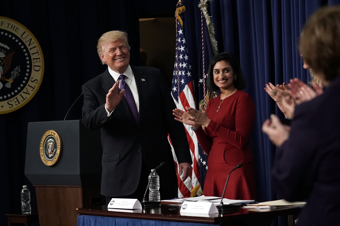 President Donald Trump waves as Administrator of the Centers for Medicare and Medicaid Services Seema Verma looks on, January 18, 2018 in Washington, DC. 