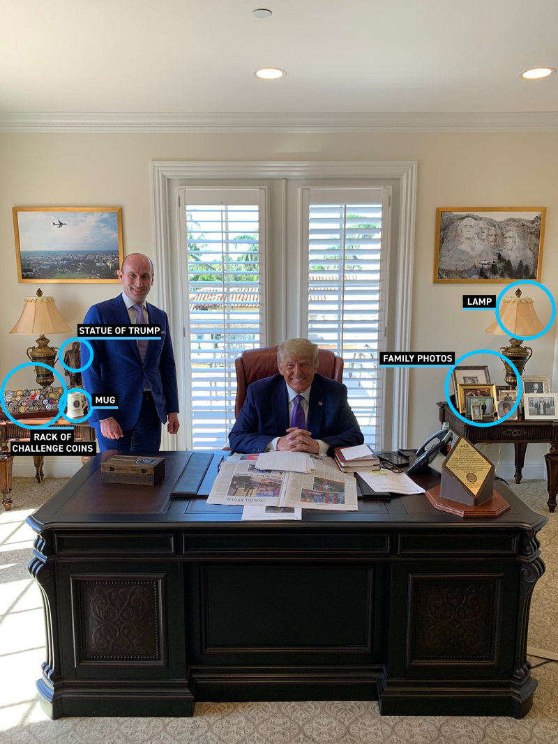 President Trump sits at his desk in his Mar-a-Lago office, surrounded by notable items. Items on the back tables, like a statue of Trump and family photos, are circled.