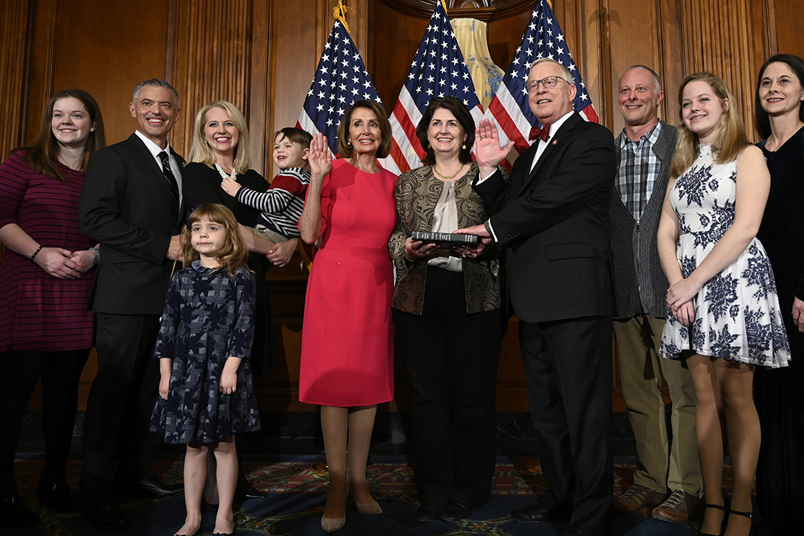 Former Rep. Ron Wright and his wife, Susan Wright, are pictured during his ceremonial swearing-in with with House Speaker Nancy Pelosi. 