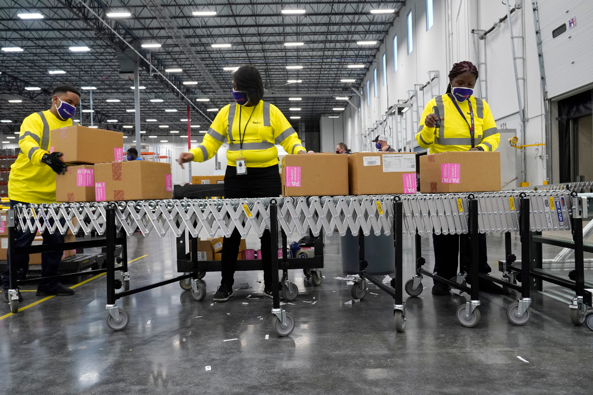 Boxes containing the Moderna COVID-19 vaccine are prepared to be shipped at the McKesson distribution center in Olive Branch, Miss., Sunday, Dec. 20, 2020. 