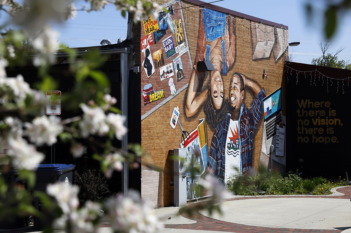 This photo shows a mural painted on the outside wall of Gibbs-Morrison Cultural Center in the 5th Ward of Evanston, Ill.