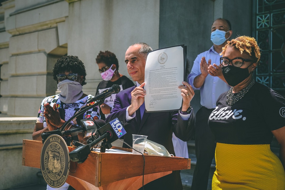 Mayor Jorge Elorza signs a community-driven Executive Order to remove Plantations from City documents and oath ceremonies in June 2020.