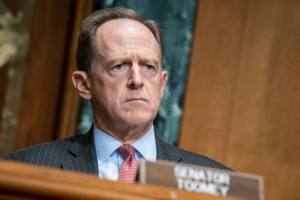 Sen. Pat Toomey listens during a congressional hearing. 