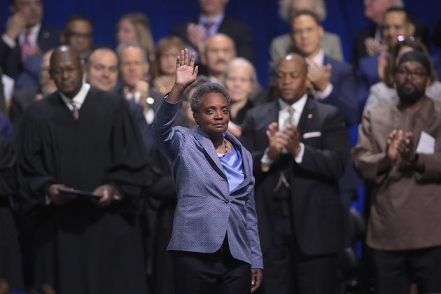 Lori Lightfoot waves to the crowd after being sworn in as Mayor of Chicago.