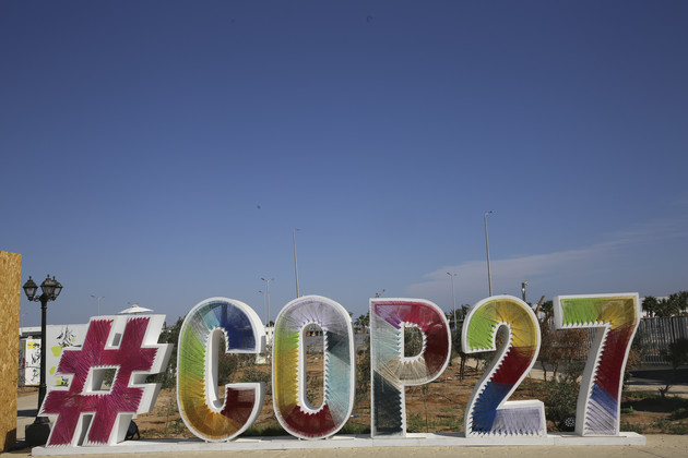 A COP27 U.N. Climate Summit sign is seen.