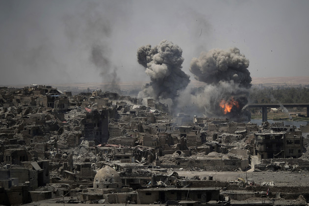 Airstrikes target Islamic State positions on the edge of the Old City in Mosul, Iraq.