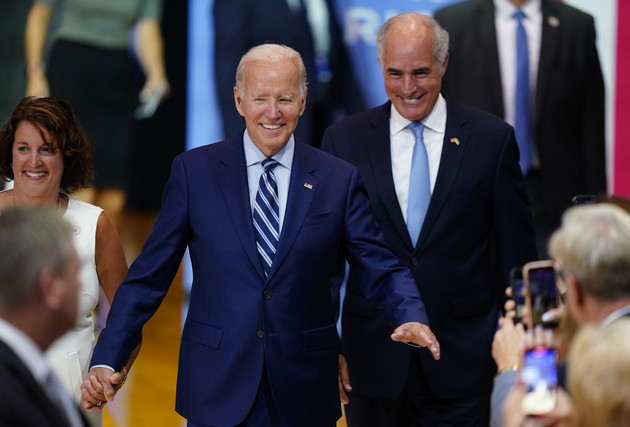 President Joe Biden arrives with Sen. Bob Casey, D-Pa.