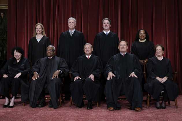 Members of the Supreme Court sit for a new group portrait. Bottom row, from left, Associate Justice Sonia Sotomayor, Associate Justice Clarence Thomas, Chief Justice of the United States John Roberts, Associate Justice Samuel Alito, and Associate Justice Elena Kagan. Top row, from left, Associate Justice Amy Coney Barrett, Associate Justice Neil Gorsuch, Associate Justice Brett Kavanaugh, and Associate Justice Ketanji Brown Jackson.