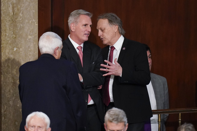 Rep. Andy Biggs (R-Ariz.) right, talks with Speaker Kevin McCarthy. 
