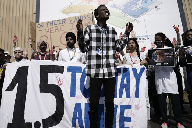 Eric Njuguna participates in a protest.