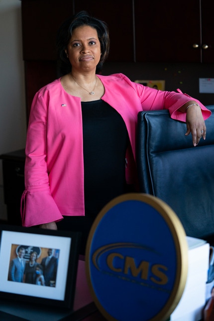Chiquita Brooks-LaSure, the Administrator for the Centers of Medicare and Medicaid Services, stands for a photograph in her office.