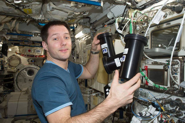  NASA astronaut Thomas Pesquet works on Merck's crystal investigation in microgravity on the International Space Station.