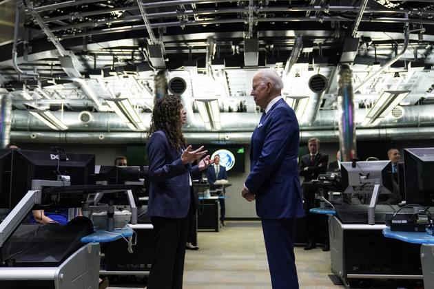 Joe Biden (right) talks with National Counterterrorism Center Director Christy Abizaid (left) during a visit to the Office of the Director of National Intelligence in McLean, Va.