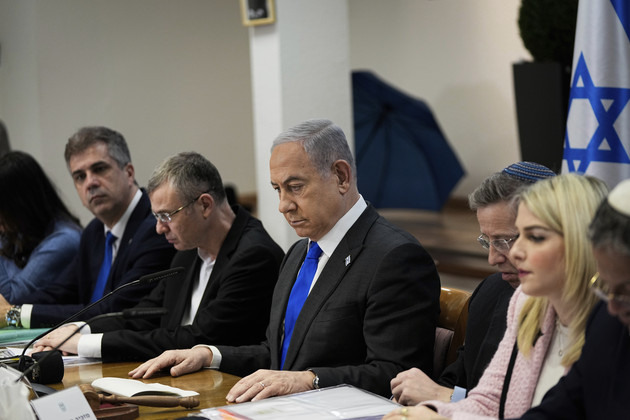 Benjamin Netanyahu (center) chairs a cabinet meeting at the Kirya military base in Tel Aviv, Israel.