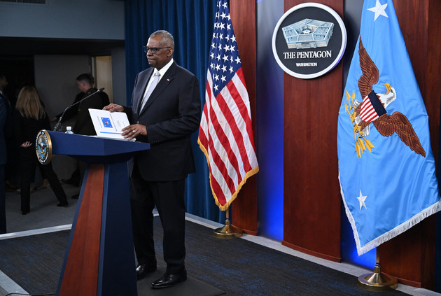 Defense Secretary Lloyd Austin arrives to speak during a press conference at the Pentagon.